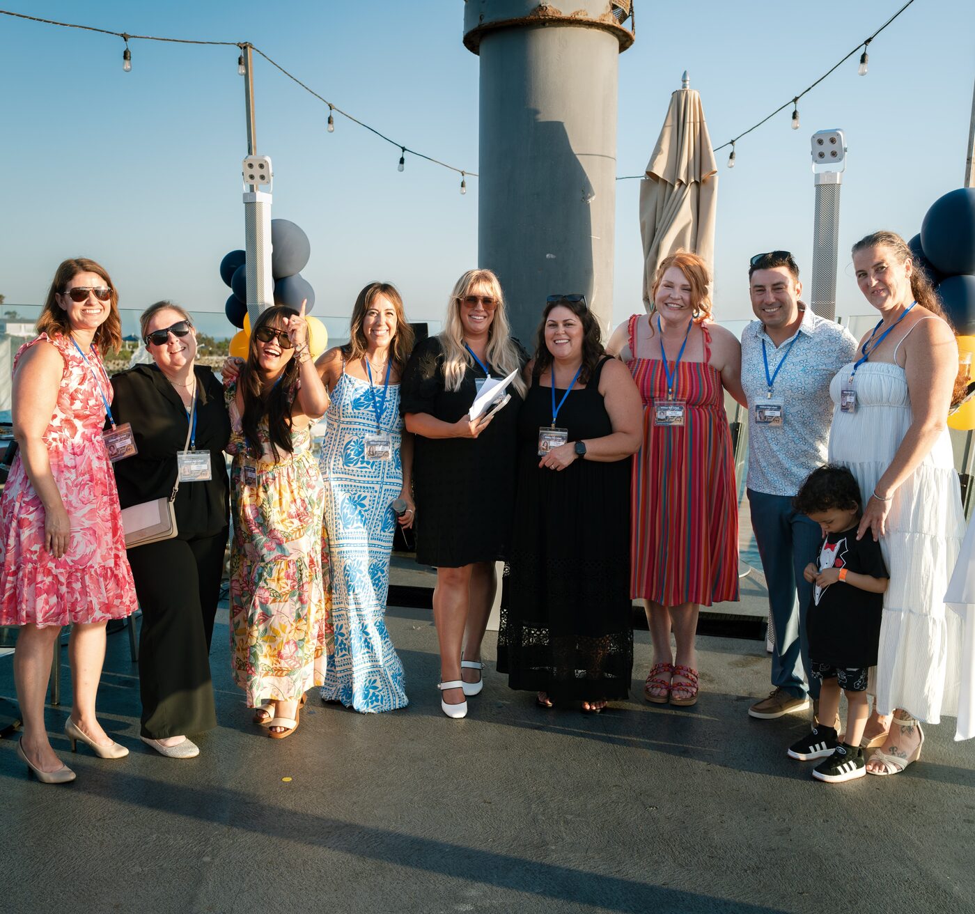 The Millikan Class of 2001 reunion committee together on the deck at Ballast Point Brewery